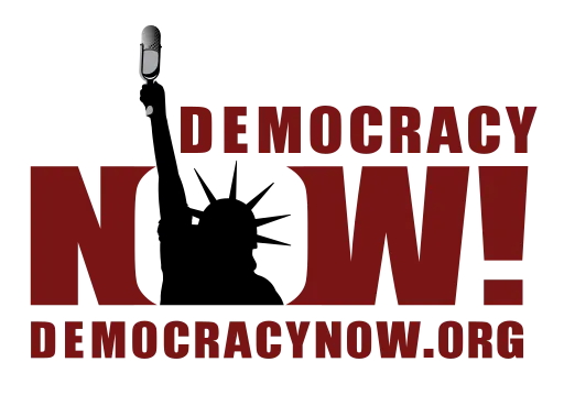 The words "Democracy Now!" with a Statue of Liberty reaching out from the O in Now.